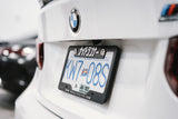 TWO NRI PLATE FRAMES