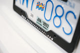 TWO NRI PLATE FRAMES